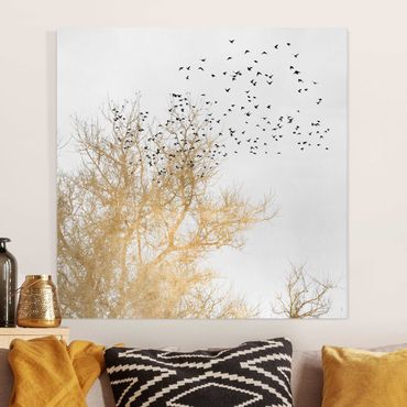 Leinwandbild - Vogelschwarm vor goldenem Baum - Quadrat 1:1