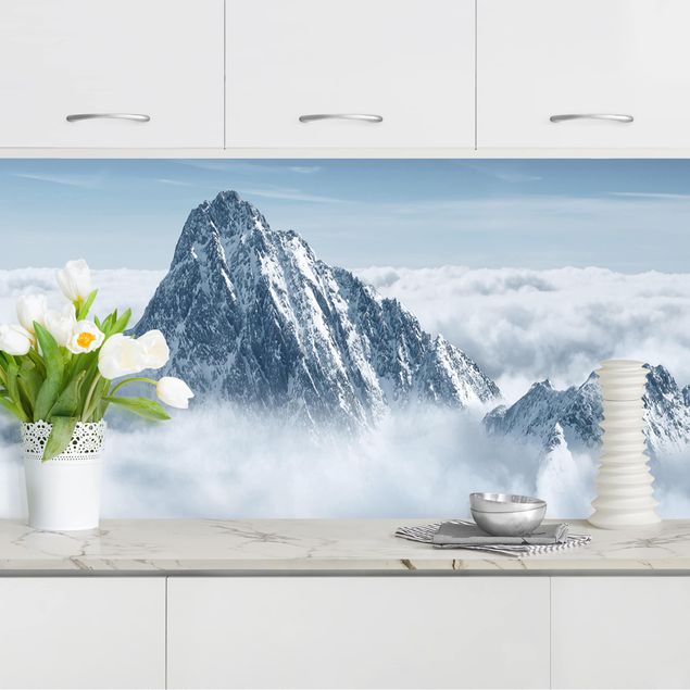 Wanddeko blau Die Alpen über den Wolken