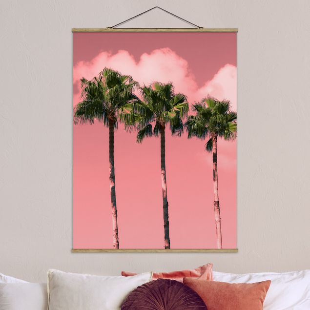 Wanddeko Wohnzimmer Palmen vor Himmel Rosa