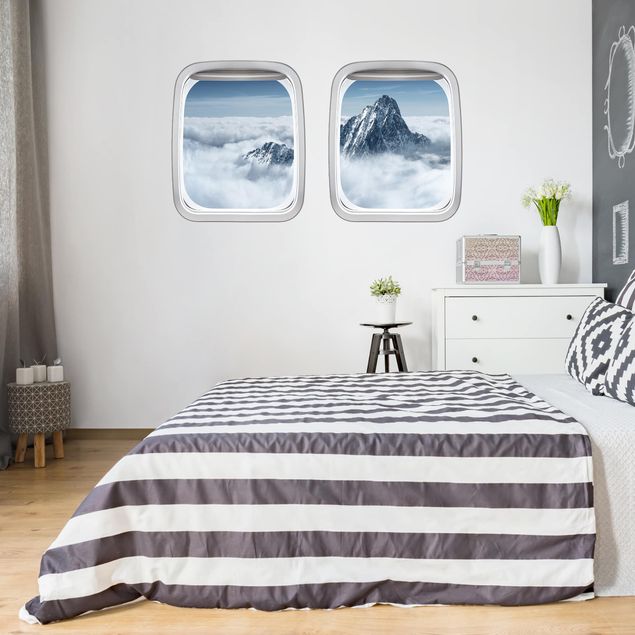 Wanddeko Schlafzimmer Doppelfenster Flugzeug Alpen über den Wolken