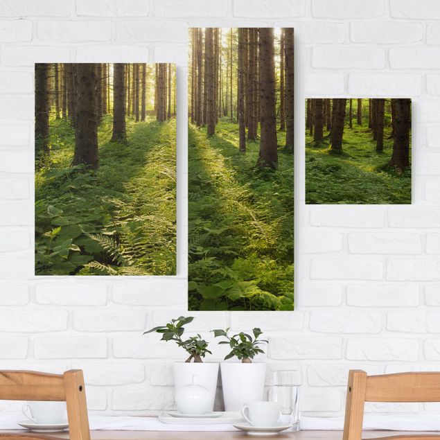 Wanddeko Wohnzimmer Sonnenstrahlen in grünem Wald
