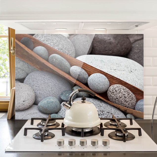 Wanddeko Küche Stillleben mit grauen Steinen