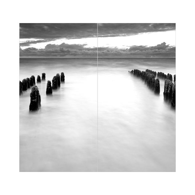 Wohndeko Meerblick Holzbuhnen in der Nordsee auf Sylt Schwarz-Weiß
