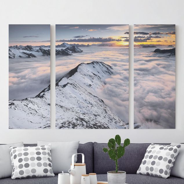 Wanddeko Wohnzimmer Blick über Wolken und Berge