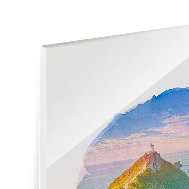 Glasbild Berg Wasserfarben - Nugget Point Leuchtturm und Meer Neuseeland