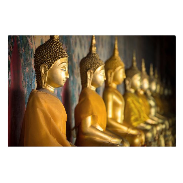 Wanddeko gold Goldene Buddha Statuen