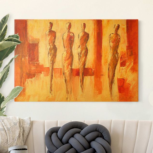 Wanddeko Wohnzimmer Vier Figuren in Orange