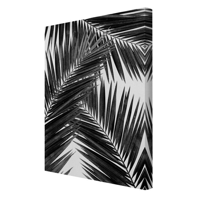Wanddeko Büro Blick durch Palmenblätter schwarz weiß