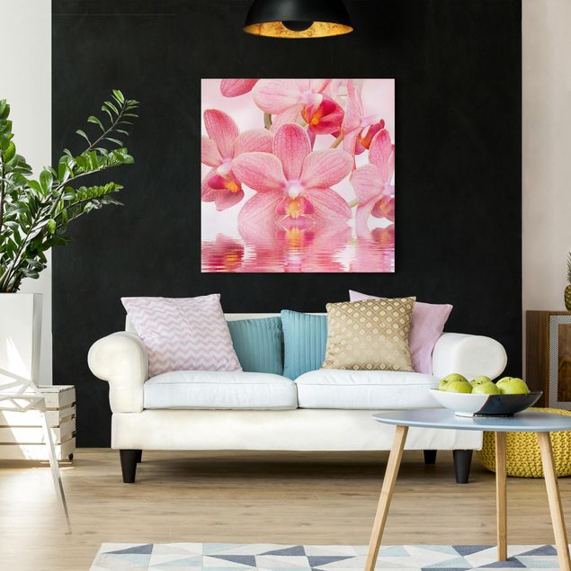 Wanddeko Wohnzimmer Rosa Orchideen auf Wasser