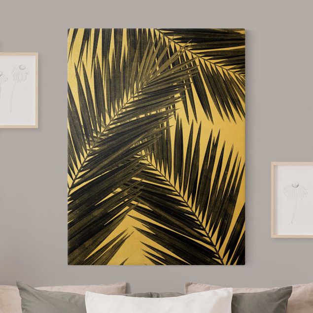 Wanddeko gold Blick durch Palmenblätter schwarz weiß