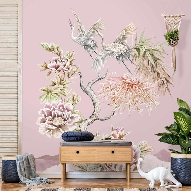 Wanddeko Wohnzimmer Aquarell Störche im Flug mit Blumen auf Rosa