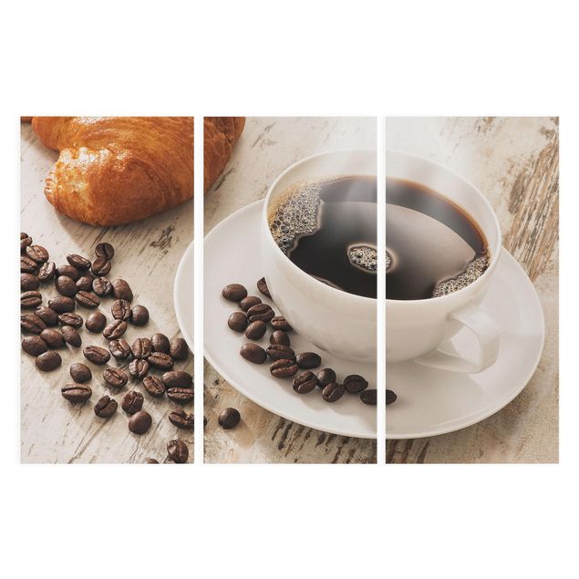 Leinwandbilder Berge Dampfende Kaffeetasse mit Kaffeebohnen