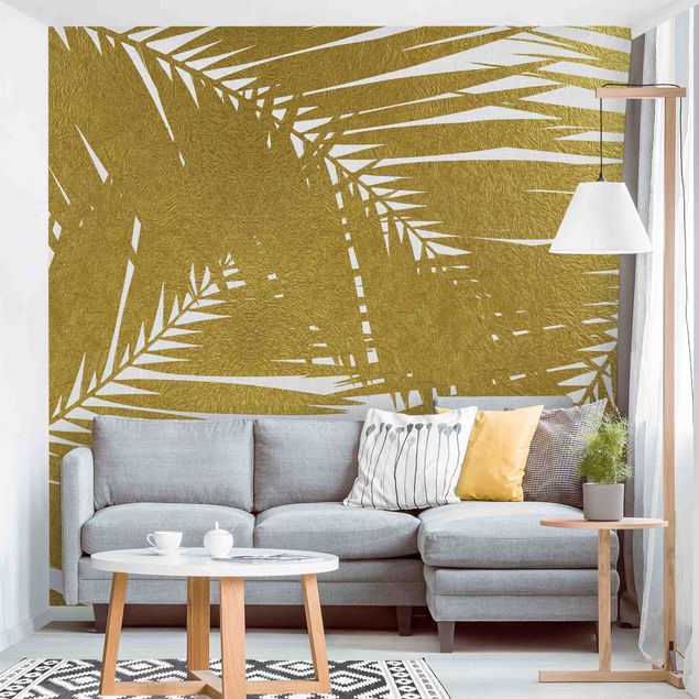 Wanddeko Flur Blick durch goldene Palmenblätter