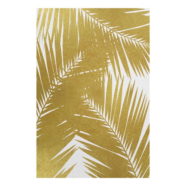 Wanddeko Büro Blick durch goldene Palmenblätter