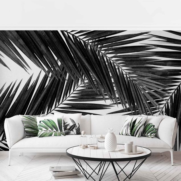 Wanddeko Flur Blick durch Palmenblätter Schwarz-Weiß
