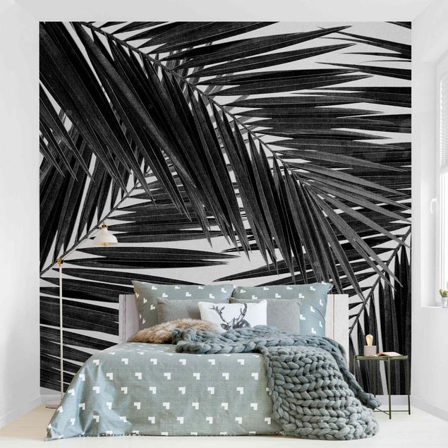Wanddeko Flur Blick durch Palmenblätter schwarz weiß