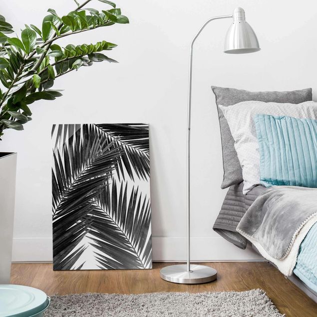 Wanddeko Schlafzimmer Blick durch Palmenblätter schwarz weiß