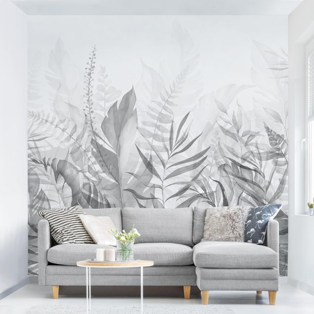 Wanddeko Wohnzimmer Botanik - Tropische Blätter Grau