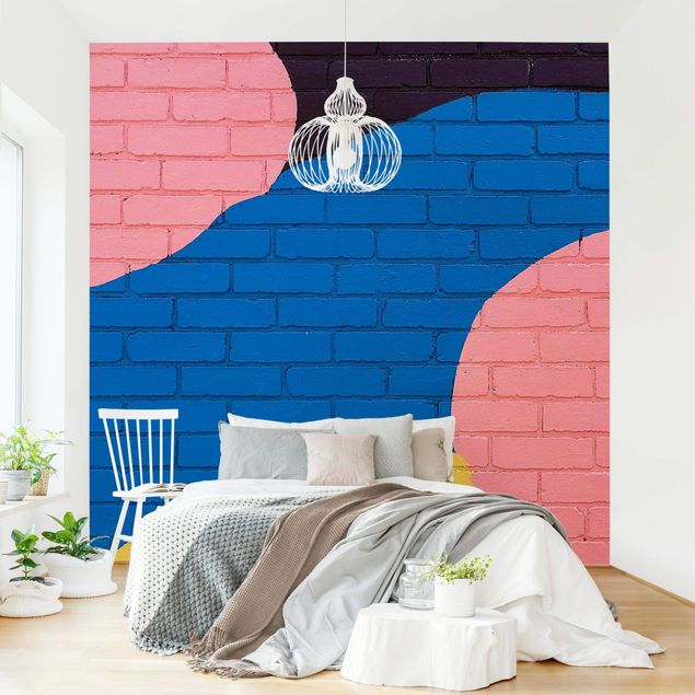 Wanddeko Wohnzimmer Bunte Ziegelwand in Blau und Rosa