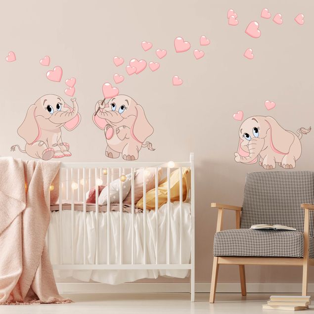 Wanddeko Babyzimmer Drei rosa Elefantenbabies mit Herzen