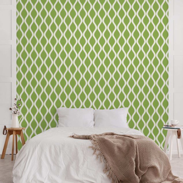 Wanddeko Schlafzimmer Dunkles Retro Muster mit glänzenden Wellen in hellgrün