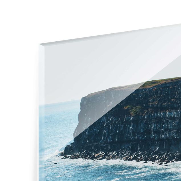 Wanddeko über Sofa Felsige Klippen auf Island