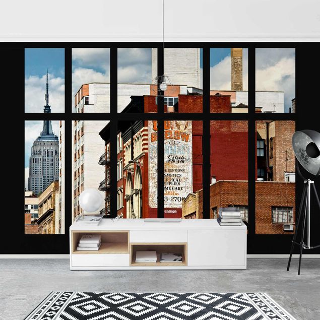 Wanddeko Wohnzimmer Fensterblick auf New York Gebäude