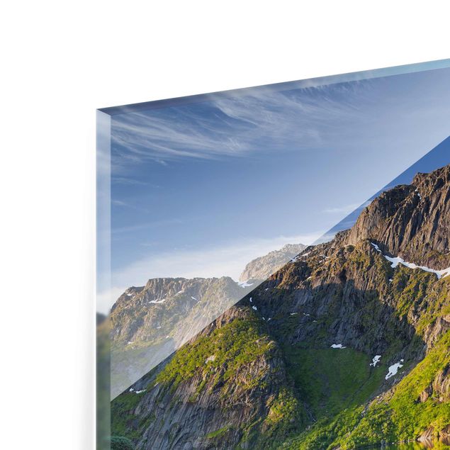 Wanddeko über Sofa Berglandschaft mit Wasserspiegelung in Norwegen