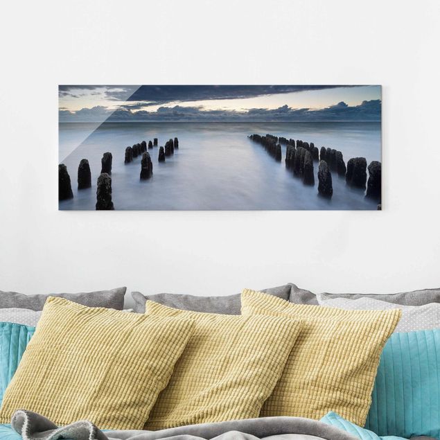 Wanddeko blau Holzbuhnen in der Nordsee auf Sylt