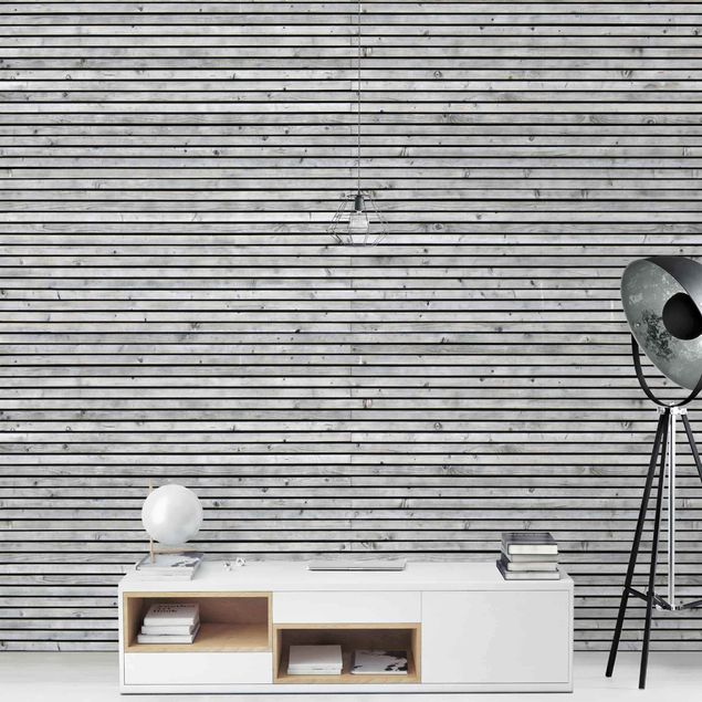 Wanddeko grau Holzwand mit schmalen Leisten schwarz weiß