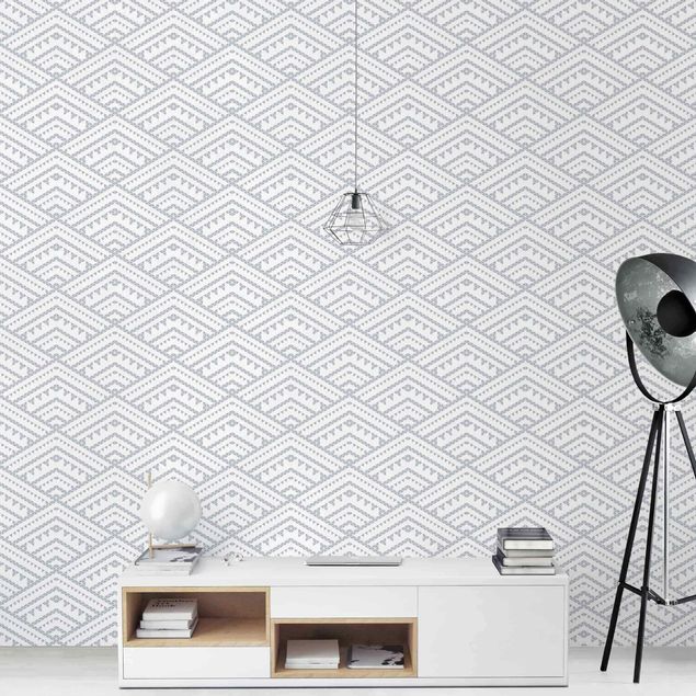 Wanddeko Schlafzimmer Muster aus kleinen Dreiecken in Grau