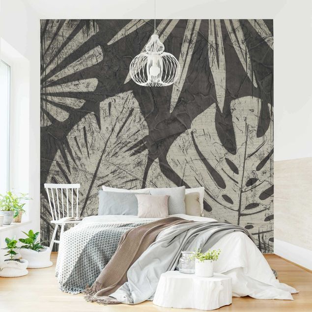 Wanddeko Wohnzimmer Palmenblätter vor Dunkelgrau