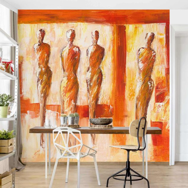 Wanddeko Wohnzimmer Vier Figuren in Orange