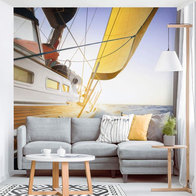 Wanddeko Wohnzimmer Segelboot auf blauem Meer bei Sonnenschein