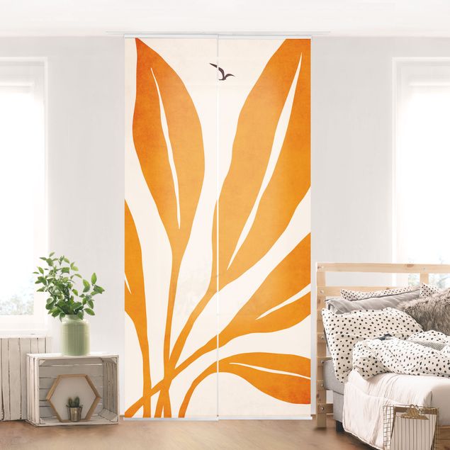 Wanddeko Wohnzimmer Strahlende Blätter in Orange