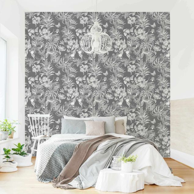 Wanddeko Wohnzimmer Tropische Blumen vor Grau