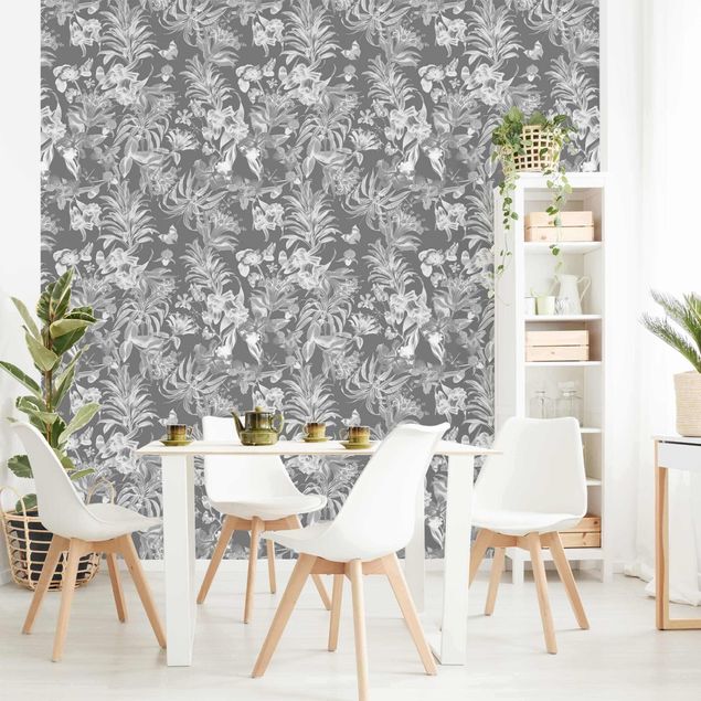 Wanddeko grau Tropische Blumen vor Grau