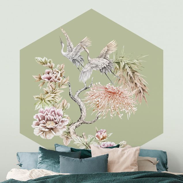 Wanddeko Schlafzimmer Aquarell Störche im Flug mit Blumen auf Grün