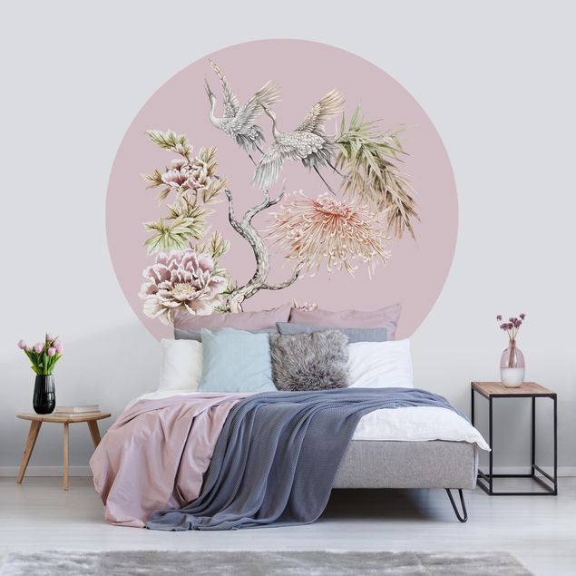 Wanddeko Wohnzimmer Aquarell Störche im Flug mit Blumen auf Rosa