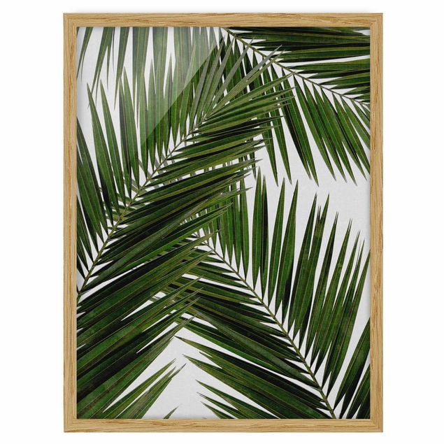 Wanddeko Esszimmer Blick durch grüne Palmenblätter