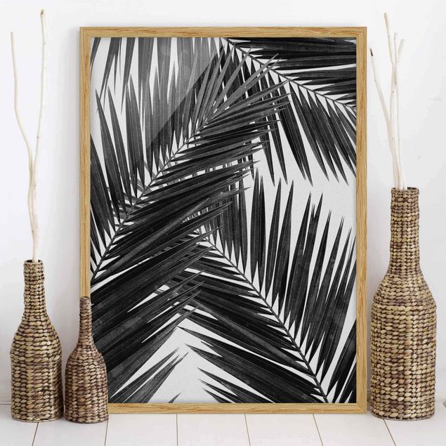 Wanddeko Wohnzimmer Blick durch Palmenblätter schwarz weiß
