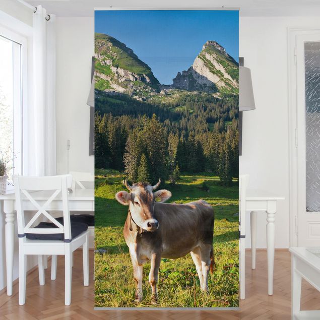 Wanddeko Schlafzimmer Schweizer Almwiese mit Kuh
