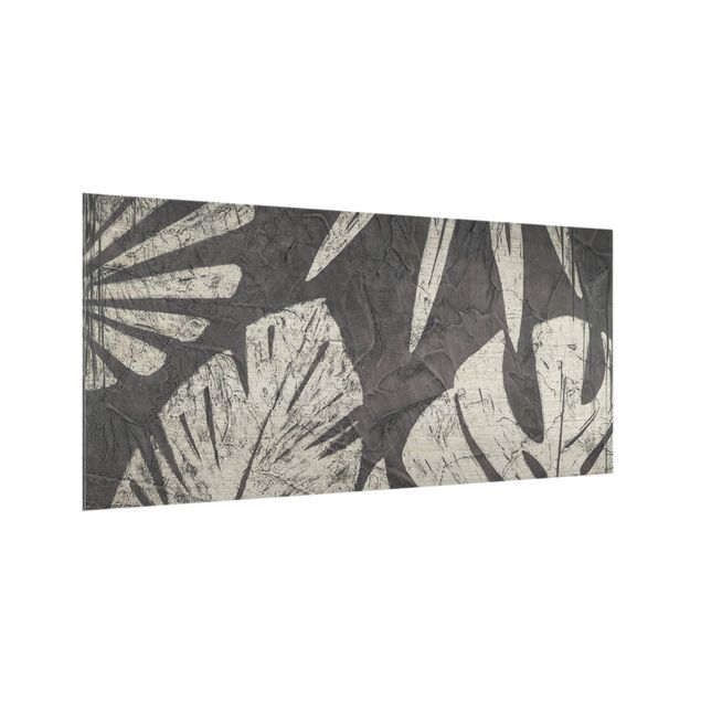Wanddeko grau Palmenblätter vor Dunkelgrau