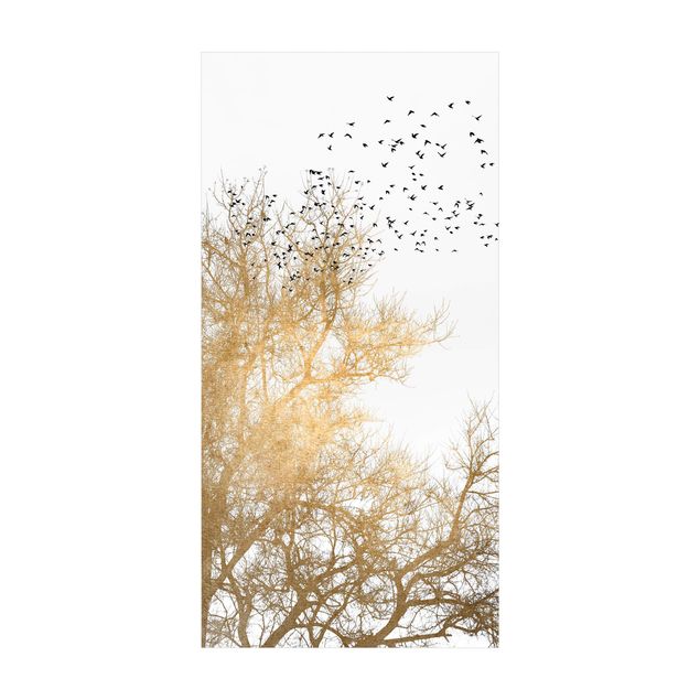 Wanddeko Treppenhaus Vogelschwarm vor goldenem Baum