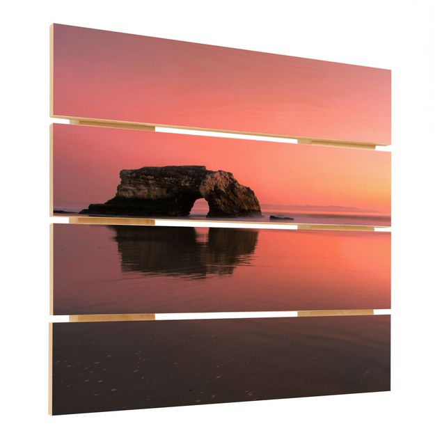 Wanddeko rot Natürliche Brücke im Sonnenuntergang