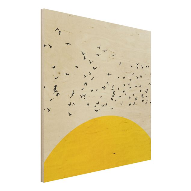 Wanddeko gelb Vogelschwarm vor gelber Sonne