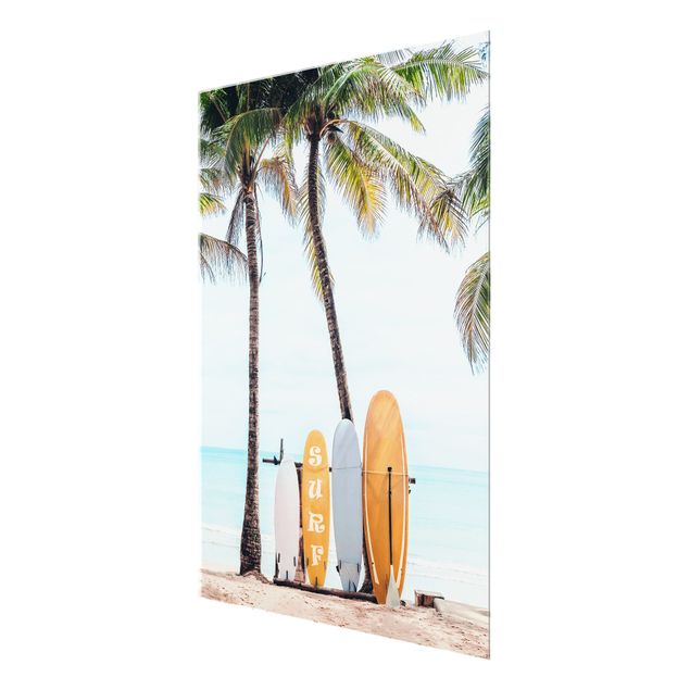 Wanddeko über Sofa Gelbe Surfboards unter Palmen