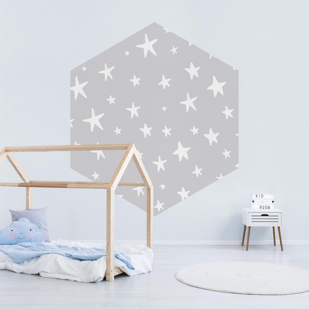 Wanddeko Babyzimmer Gezeichnete große Sterne im Grauen Himmel