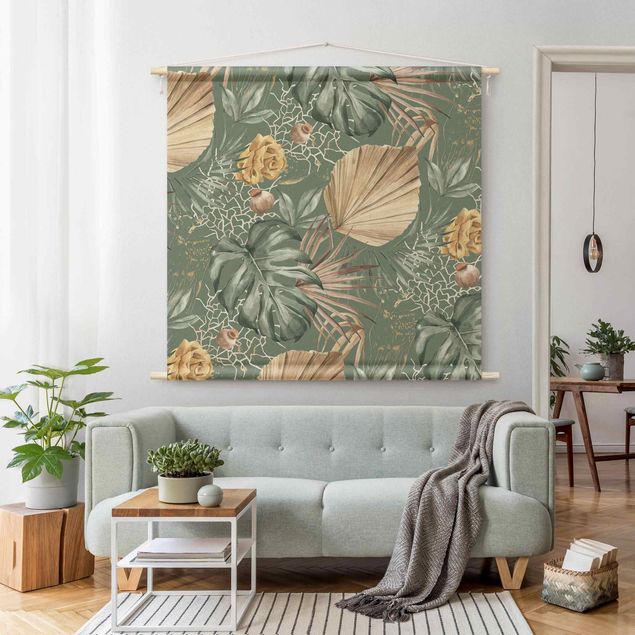 Wanddeko Wohnzimmer Große Blätter mit Rosen vor Grün