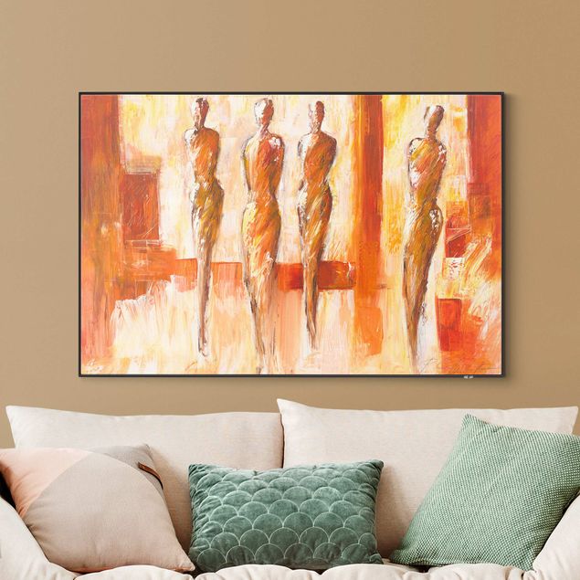 Wanddeko über Sofa Vier Figuren in Orange